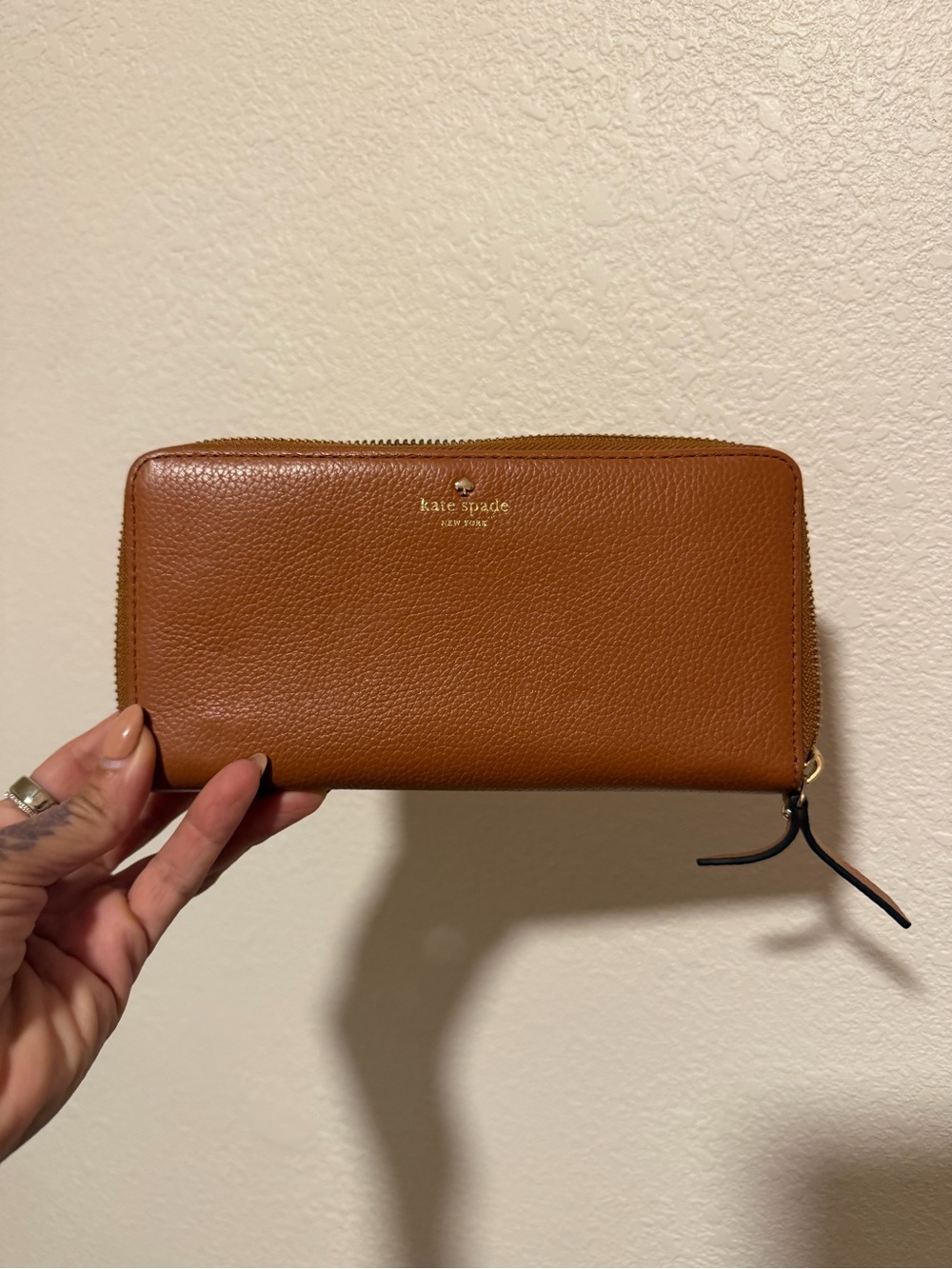 kate spade Brown Pebbled Leather Zip Wallet with Gold Logo